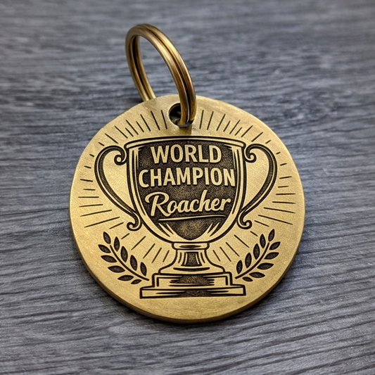 Solid brass dog tag with 'World Champion Roacher' engraved on it