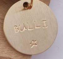 Solid brass Dog Tag with star hand stamped on it